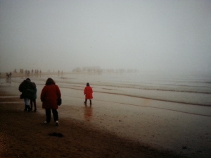 Walking through the mists to the spit...the northern most tippy-tip of Denmark, as seen in the distance. Skagen, April 1995.